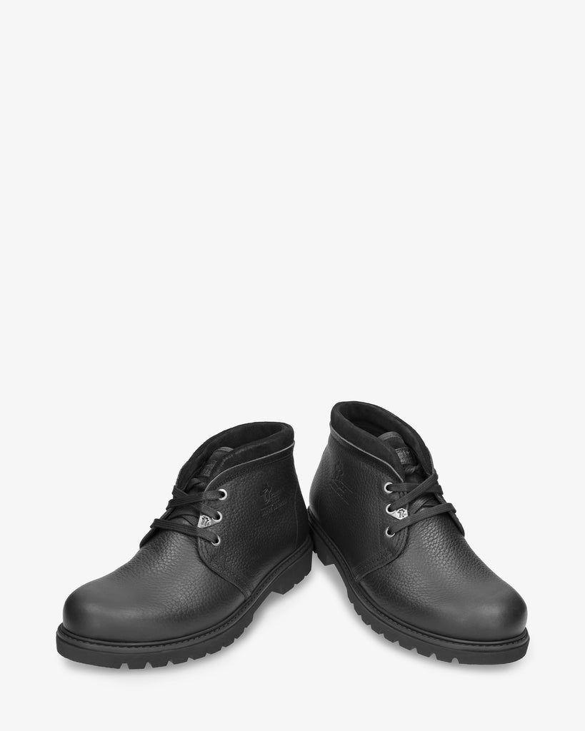 Bota Panama Tor botín de piel con forro interior de pelo. negro