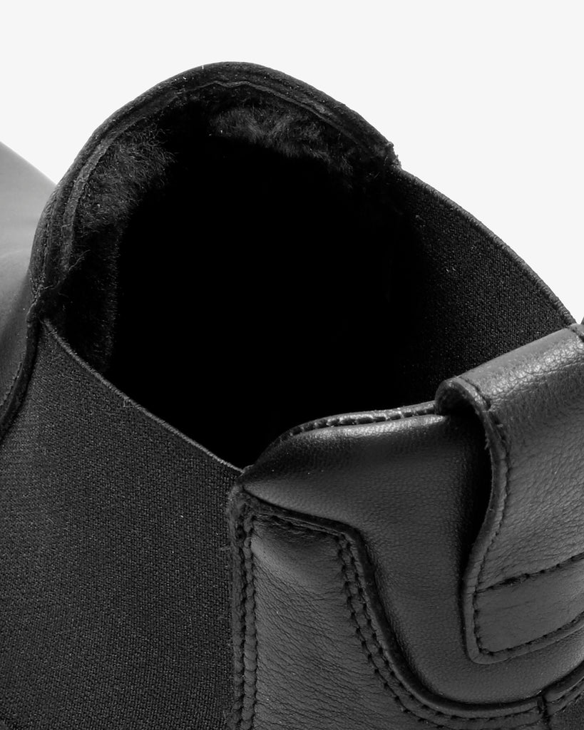 Edwin Igloo botines de piel con forro interior de pelo natural. negro