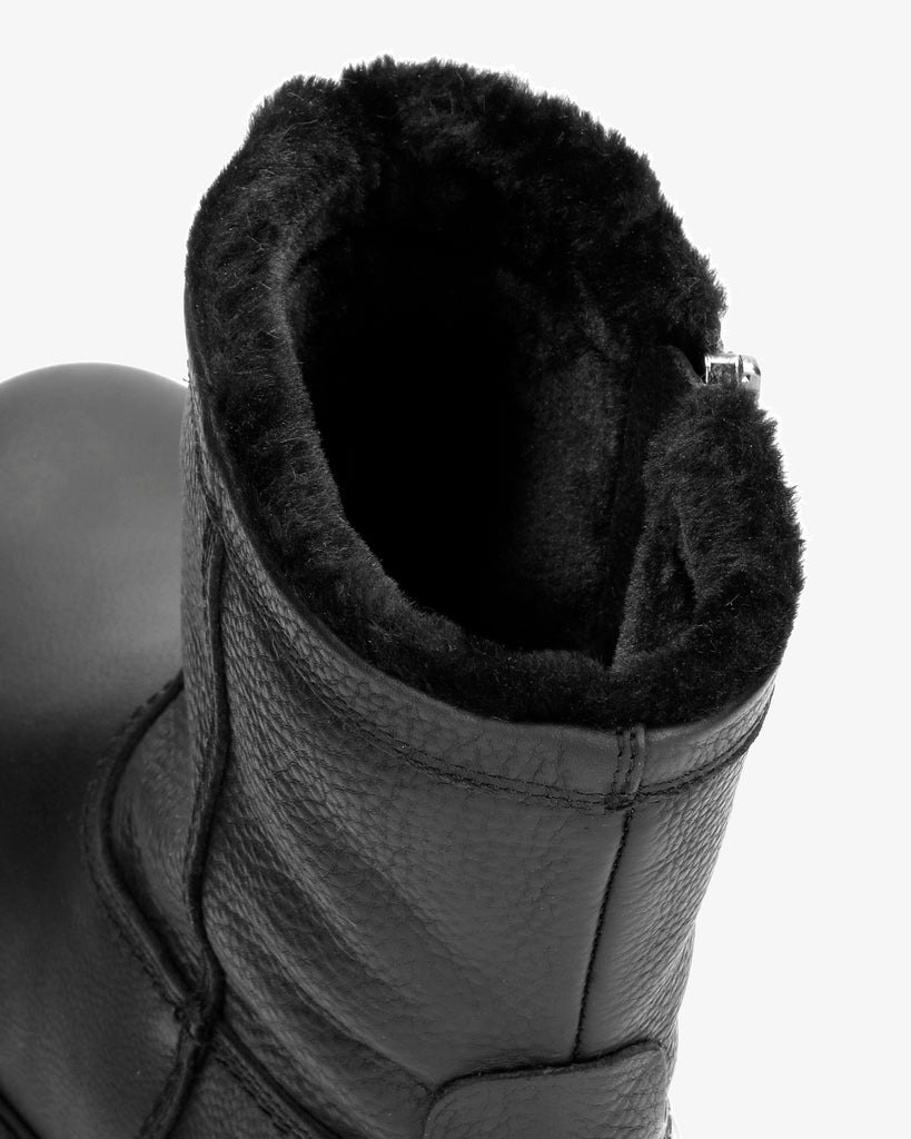 Fedro botas de piel con forro interior de pelo. negro