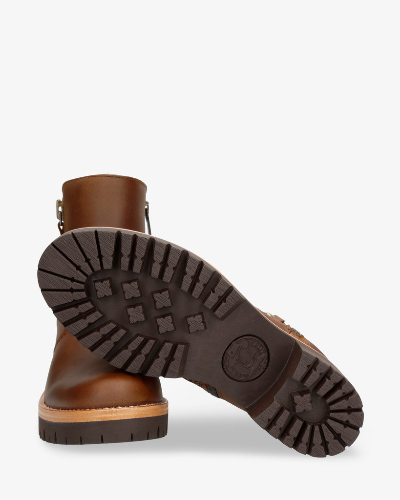 Pauline botines de piel con forro interior de pelo. cuero