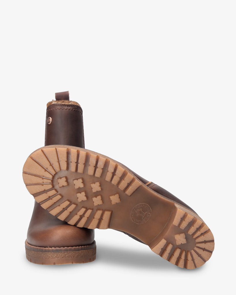 Pia botines de piel con forro interior de pelo. cuero